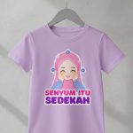 kaos anak muslimah senyum itu sedekah